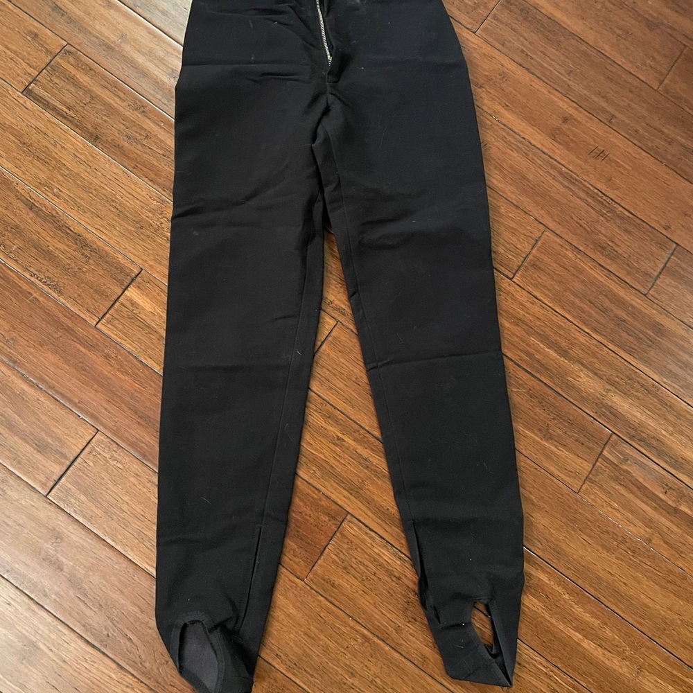 Woman stir up ski pants